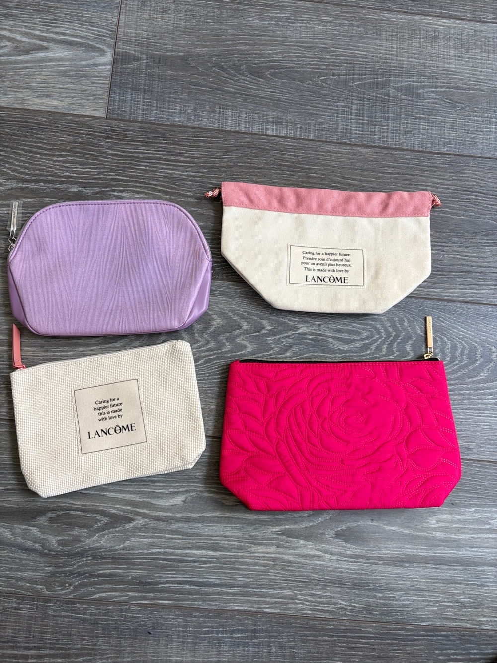 Lancôme Four-Piece Cosmetic Pouch Set in Pink, Cream, Lavender, Fuchsia
